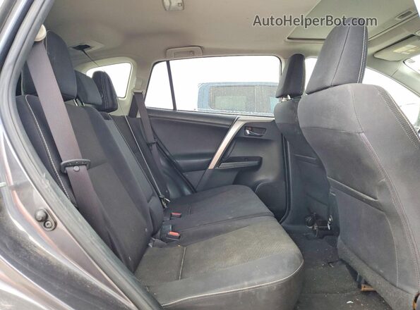 JTMWFREV0HJ700186 2017 TOYOTA RAV4 Gray Rear interior view