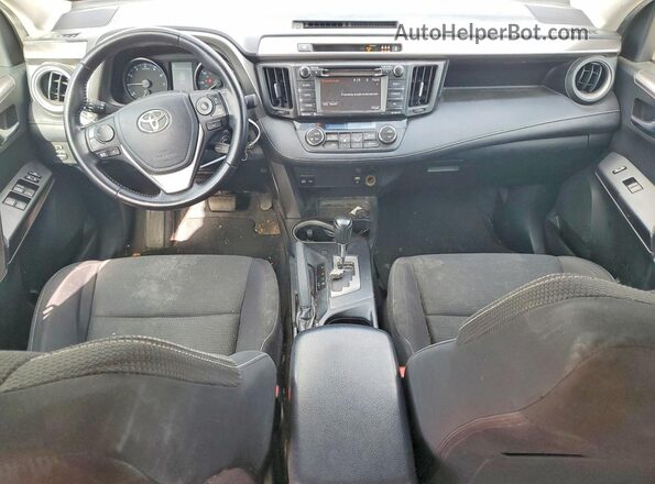 JTMWFREV0HJ700186 2017 TOYOTA RAV4 Gray Dashboard view