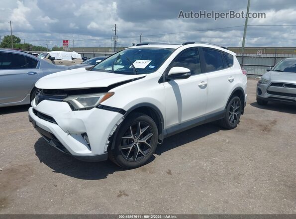 JTMWFREV0JD127715 2018 TOYOTA RAV4 White Front left