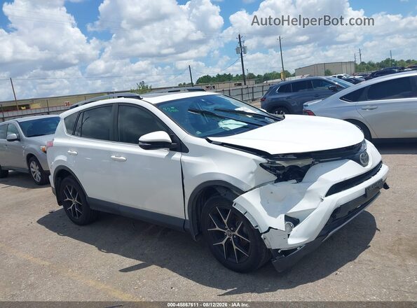 JTMWFREV0JD127715 2018 TOYOTA RAV4 White Rear interior view