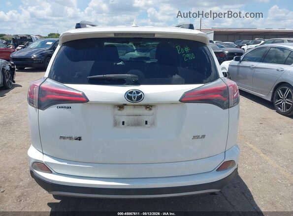 JTMWFREV0JD127715 2018 TOYOTA RAV4 White 
