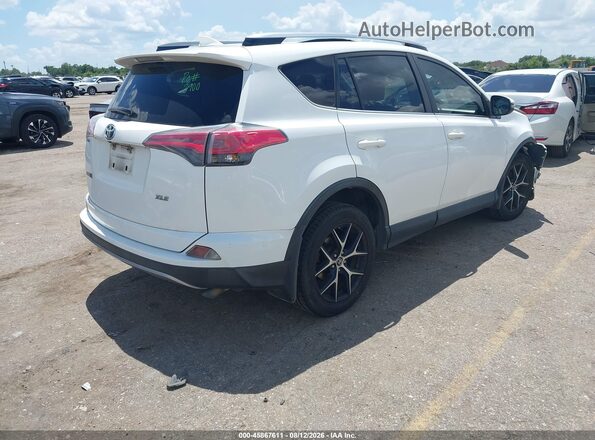 JTMWFREV0JD127715 2018 TOYOTA RAV4 White Rear right