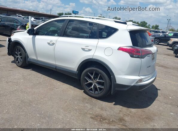 JTMWFREV0JD127715 2018 TOYOTA RAV4 White Rear left