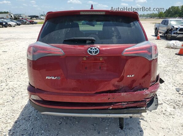JTMWFREV0JD129397 2018 TOYOTA RAV4 Red Rear view