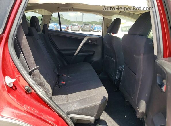 JTMWFREV0JD129397 2018 TOYOTA RAV4 Red Rear interior view