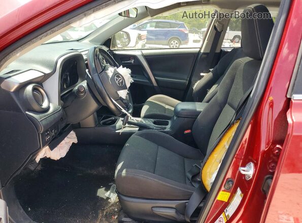 JTMWFREV0JD129397 2018 TOYOTA RAV4 Red Front interior view