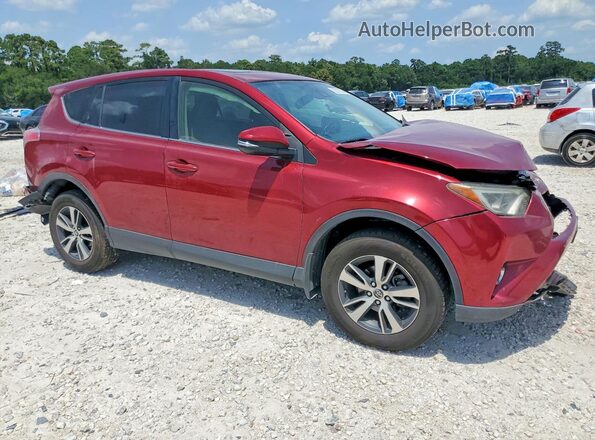 JTMWFREV0JD129397 2018 TOYOTA RAV4 Red Front right