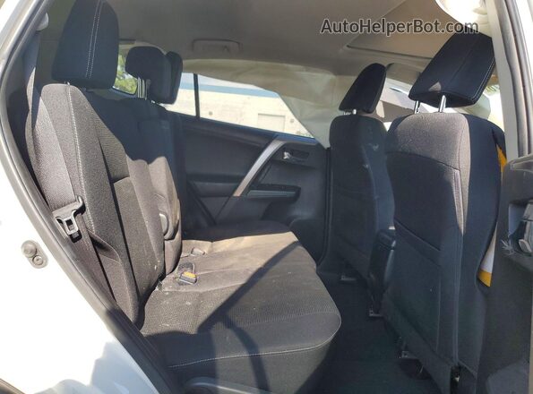 JTMWFREV0JJ165284 2018 TOYOTA RAV4 Белый Вид задней части салона