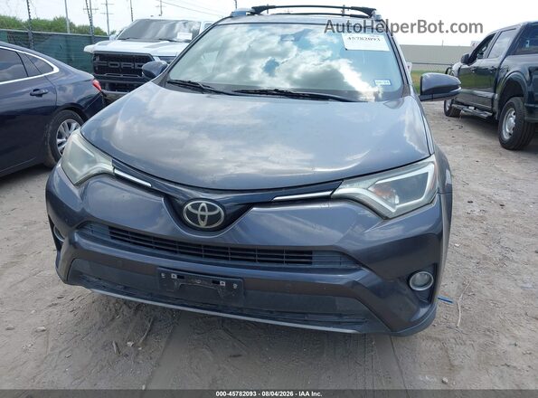 JTMWFREV1HJ111986 2017 TOYOTA RAV4 Gray უკანა სალონის ხედი