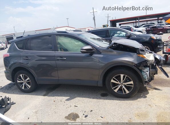 JTMWFREV2HJ711464 2017 TOYOTA RAV4 Серый Вид задней части салона