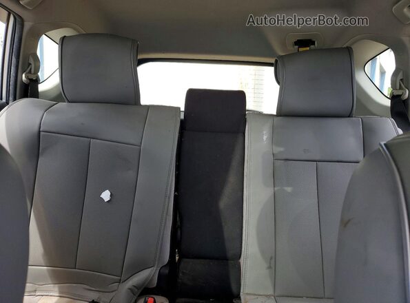 JTMWFREV2JJ179185 2018 TOYOTA RAV4 Silver Widok tylnych siedzeń