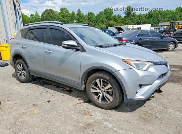 JTMWFREV2JJ179185 2018 TOYOTA RAV4 Silver Przód prawy