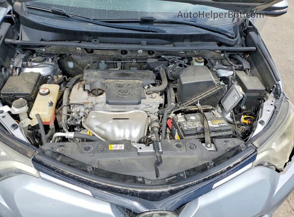 JTMWFREV2JJ179185 2018 TOYOTA RAV4 Silver Widok komory silnika