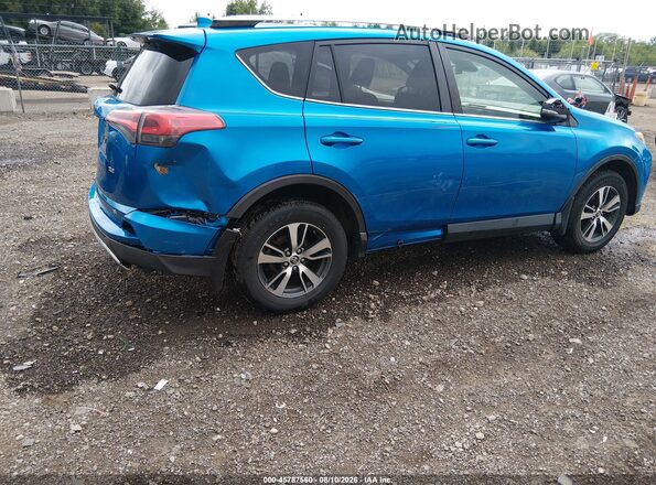 JTMWFREV2JJ185634 2018 TOYOTA RAV4 Blue Դիմացի տեսք