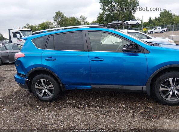 JTMWFREV2JJ185634 2018 TOYOTA RAV4 Blue Սալոնի հետևի տեսք