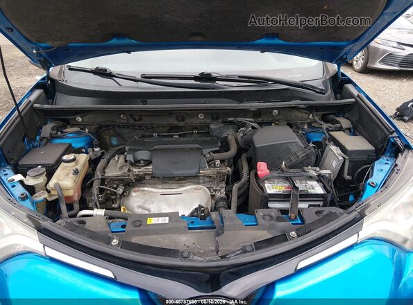 JTMWFREV2JJ185634 2018 TOYOTA RAV4 Blue Հետևի տեսք