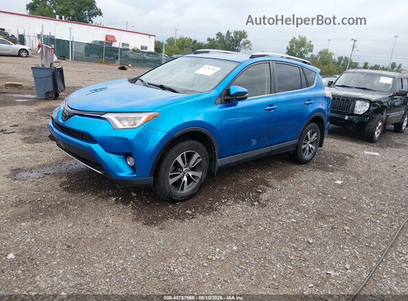 JTMWFREV2JJ185634 2018 TOYOTA RAV4 Blue Առջևի ձախ երեք քառորդ տեսարան