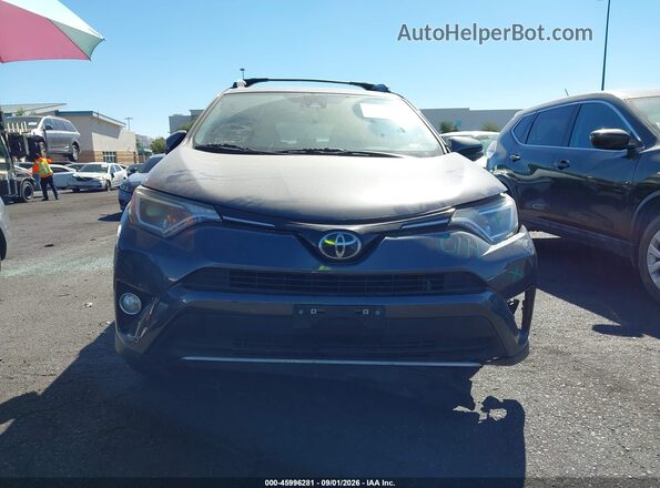 JTMWFREV2JJ740291 2018 TOYOTA RAV4 Gray ხელსაწყოთა პანელის ხედი