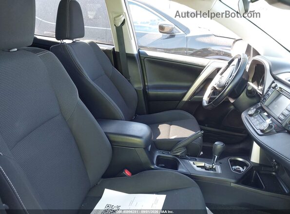 JTMWFREV2JJ740291 2018 TOYOTA RAV4 Gray წინა სალონის ხედი
