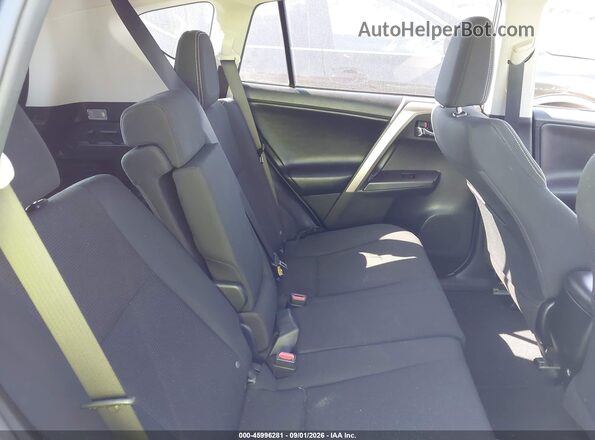 JTMWFREV2JJ740291 2018 TOYOTA RAV4 Gray VIN კოდის სტიკერის ხედი
