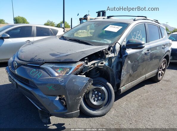 JTMWFREV2JJ740291 2018 TOYOTA RAV4 Gray 