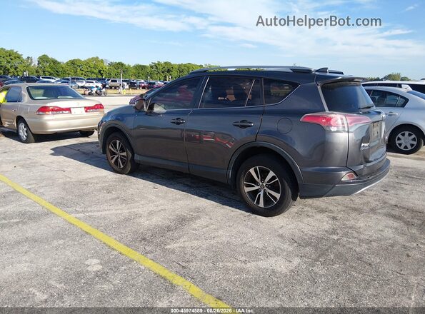 JTMWFREV3HJ701655 2017 TOYOTA RAV4 Gray Trasero izquierdo