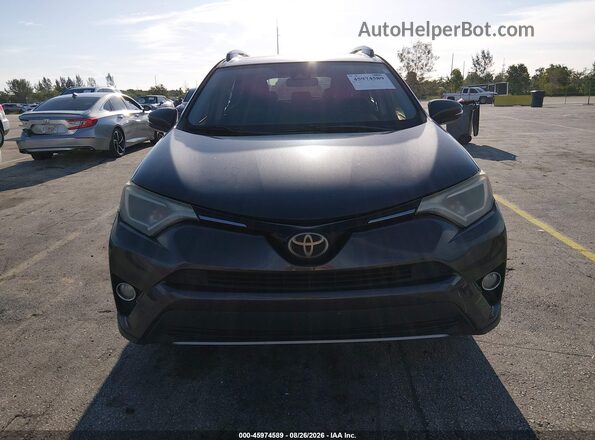 JTMWFREV3HJ701655 2017 TOYOTA RAV4 Gray Vista del cuadro de instrumentos
