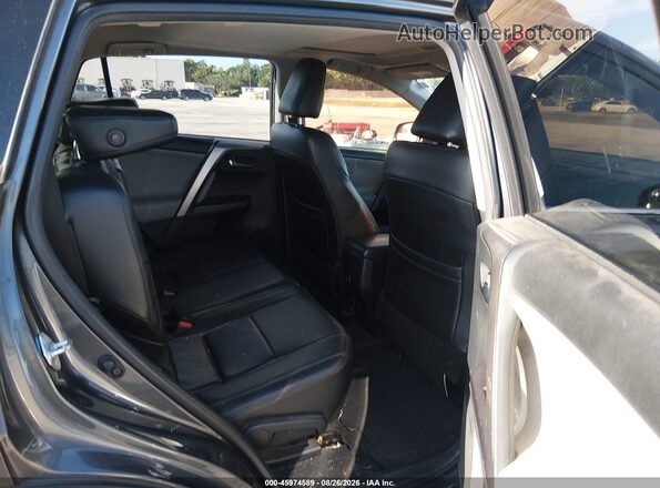 JTMWFREV3HJ701655 2017 TOYOTA RAV4 Gray Vista de la etiqueta del VIN