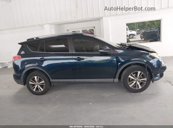 JTMWFREV4HD104528 2017 TOYOTA RAV4 Blue უკანა სალონის ხედი