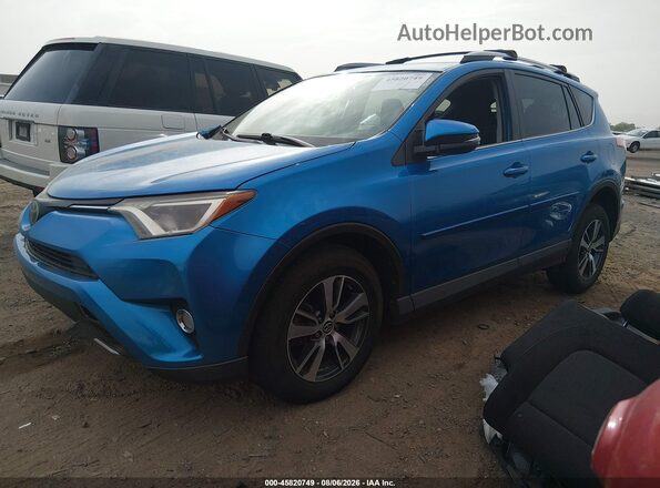 JTMWFREV5HD092860 2017 TOYOTA RAV4 Синий Передняя левая четверть