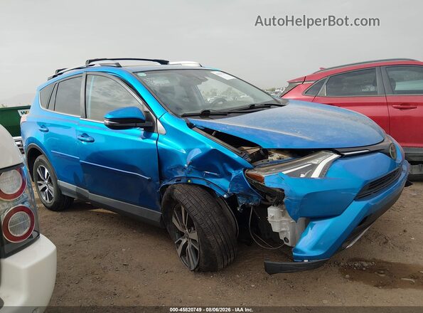 JTMWFREV5HD092860 2017 TOYOTA RAV4 Синий Вид задней части салона