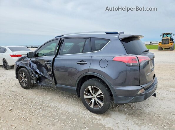 JTMWFREV5HD096214 2017 TOYOTA RAV4 Gray Rear left