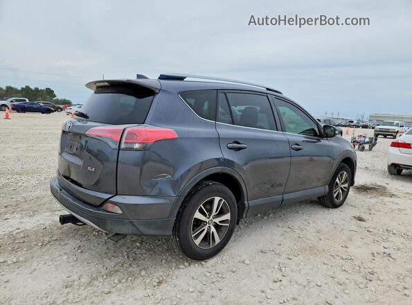 JTMWFREV5HD096214 2017 TOYOTA RAV4 Gray Rear right