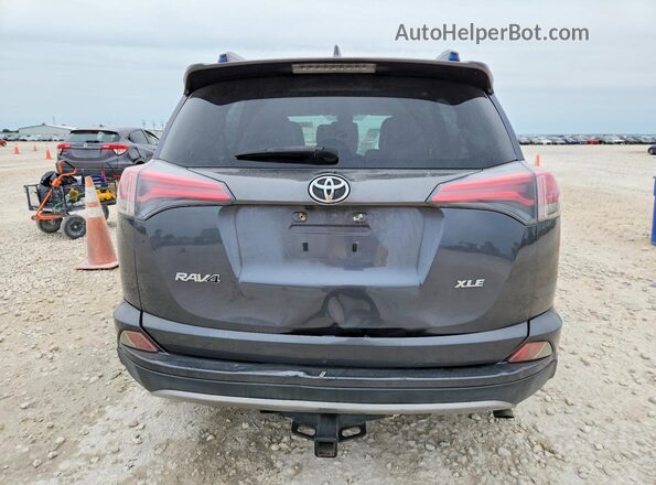 JTMWFREV5HD096214 2017 TOYOTA RAV4 Gray Rear view