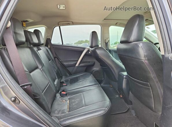 JTMWFREV5HD096214 2017 TOYOTA RAV4 Gray Rear interior view
