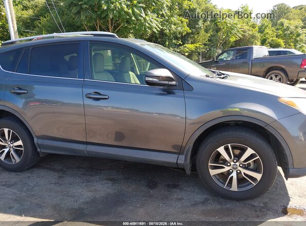 JTMWFREV5HD096570 2017 TOYOTA RAV4 Gray Սալոնի հետևի տեսք