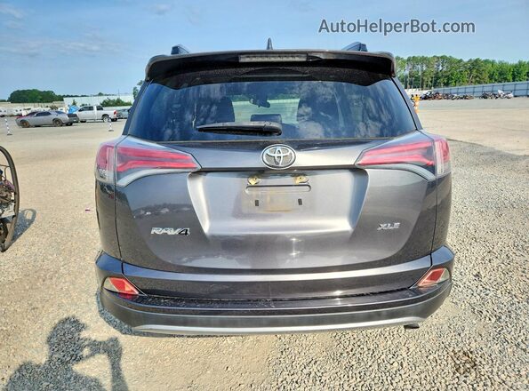 JTMWFREV5HJ701706 2017 TOYOTA RAV4 Gray Widok z tyłu