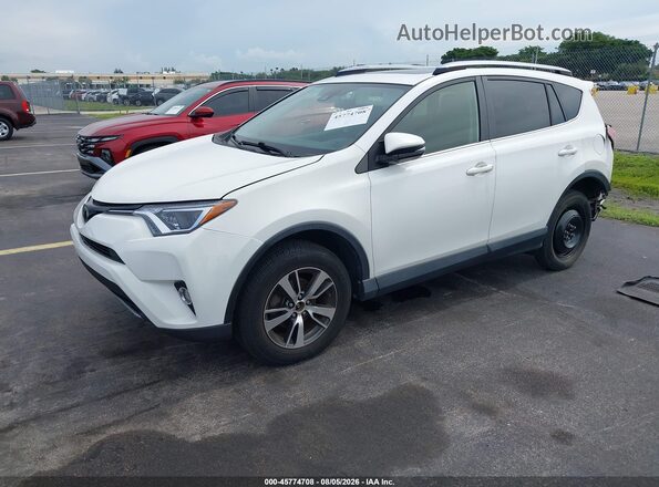 JTMWFREV5JD133610 2018 TOYOTA RAV4 White წინა მარცხენა ხედი სამი მეოთხედიდან