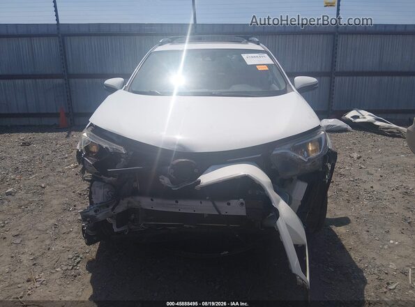 JTMWFREV6HJ119386 2017 TOYOTA RAV4 White Vista interior trasera
