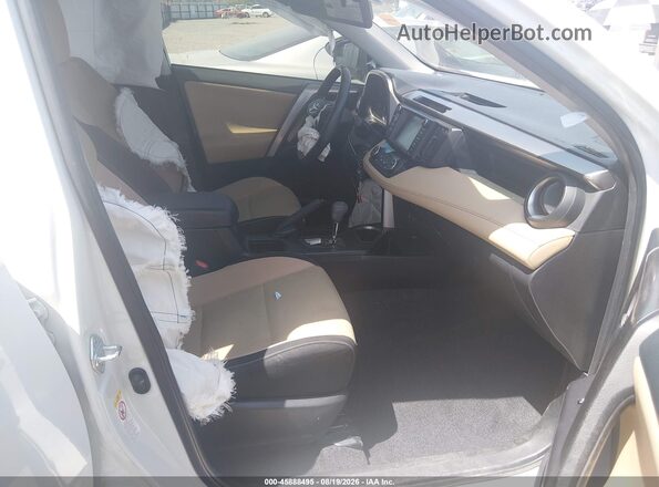 JTMWFREV6HJ119386 2017 TOYOTA RAV4 White Vista interior delantera