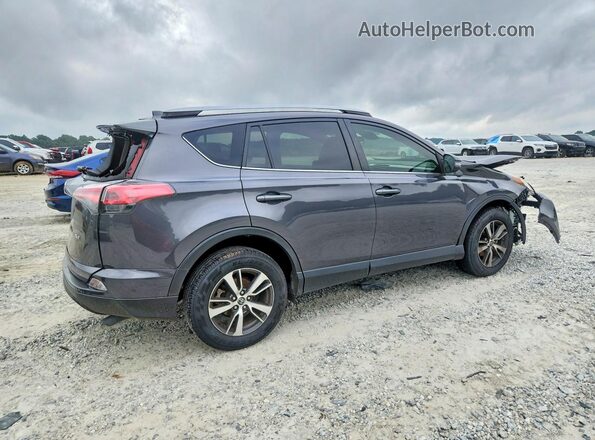 JTMWFREV6JJ150742 2018 TOYOTA RAV4 Gray Trasero derecho