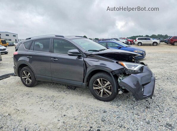 JTMWFREV6JJ150742 2018 TOYOTA RAV4 Gray Delantero derecho