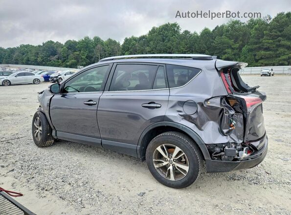 JTMWFREV6JJ150742 2018 TOYOTA RAV4 Gray Trasero izquierdo