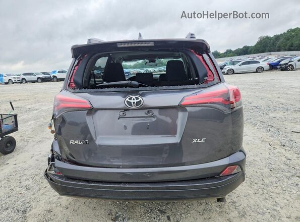 JTMWFREV6JJ150742 2018 TOYOTA RAV4 Gray Vista trasera