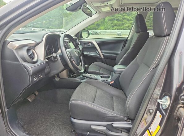 JTMWFREV6JJ150742 2018 TOYOTA RAV4 Gray Vista interior delantera