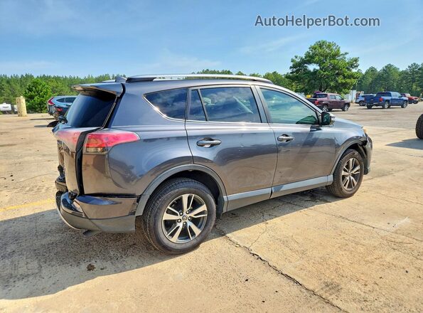 JTMWFREV6JJ153303 2018 TOYOTA RAV4 Gray Rear right