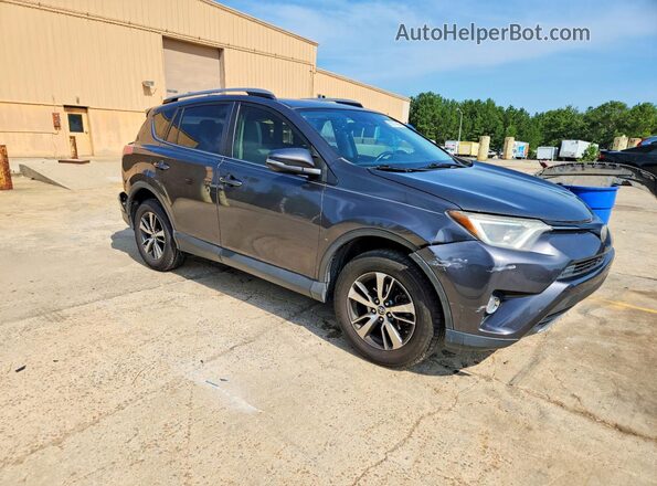 JTMWFREV6JJ153303 2018 TOYOTA RAV4 Gray Front right