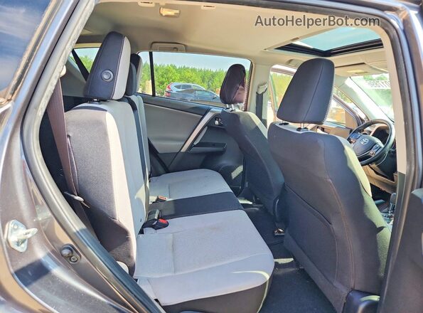 JTMWFREV6JJ153303 2018 TOYOTA RAV4 Gray Rear seats view