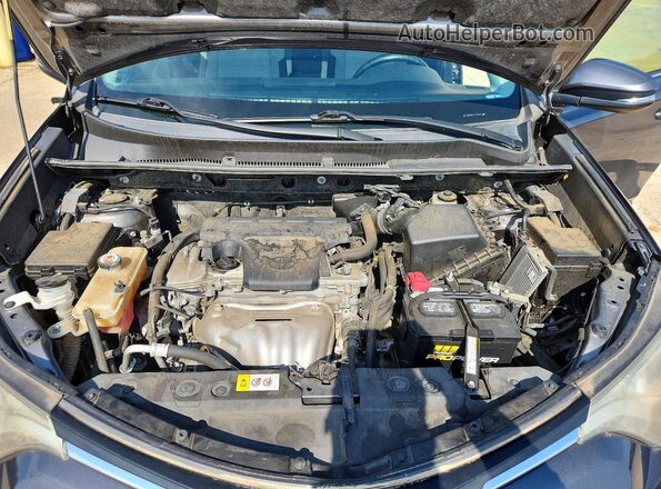 JTMWFREV6JJ153303 2018 TOYOTA RAV4 Gray Rear interior view