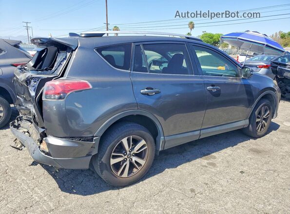 JTMWFREV7GJ075543 2016 TOYOTA RAV4 Gray Rear right